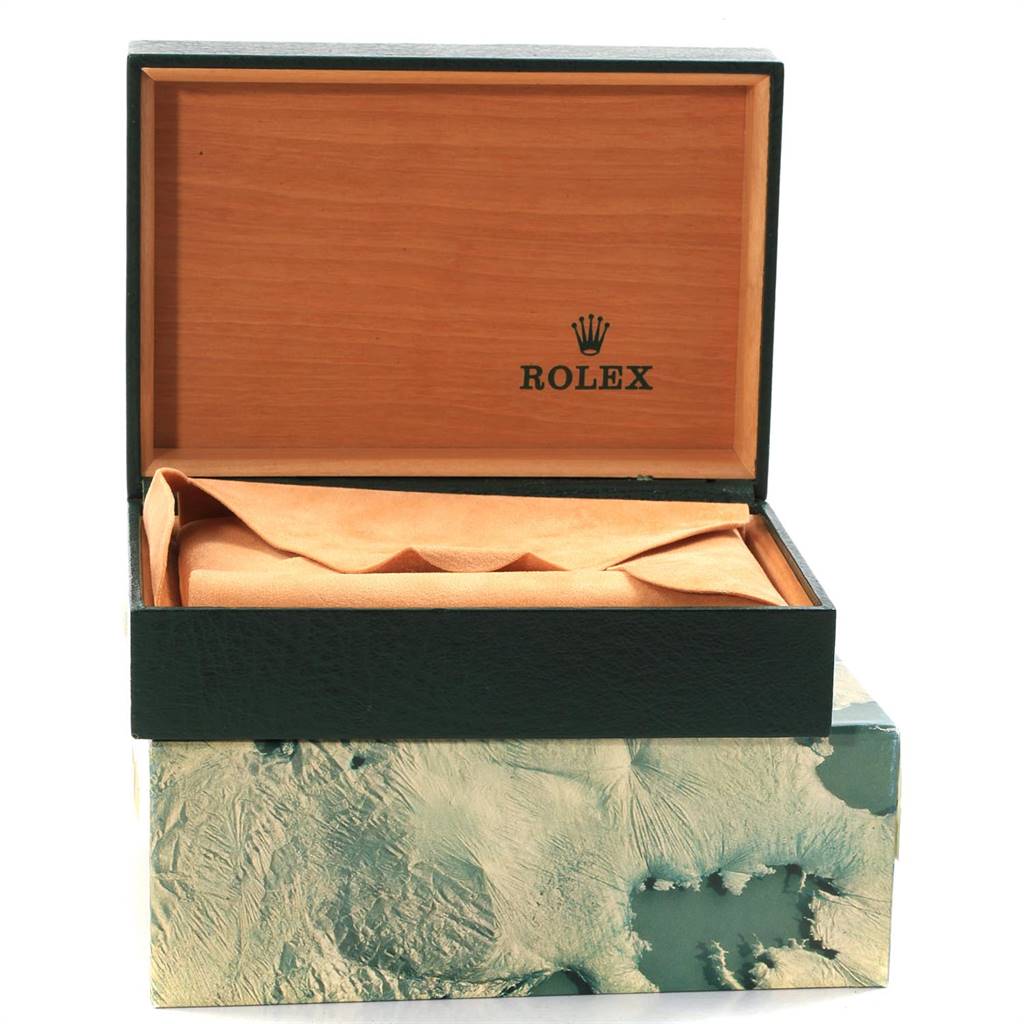 This image shows an open Rolex watch box, likely for the Oysterquartz model, displaying its interior and exterior.