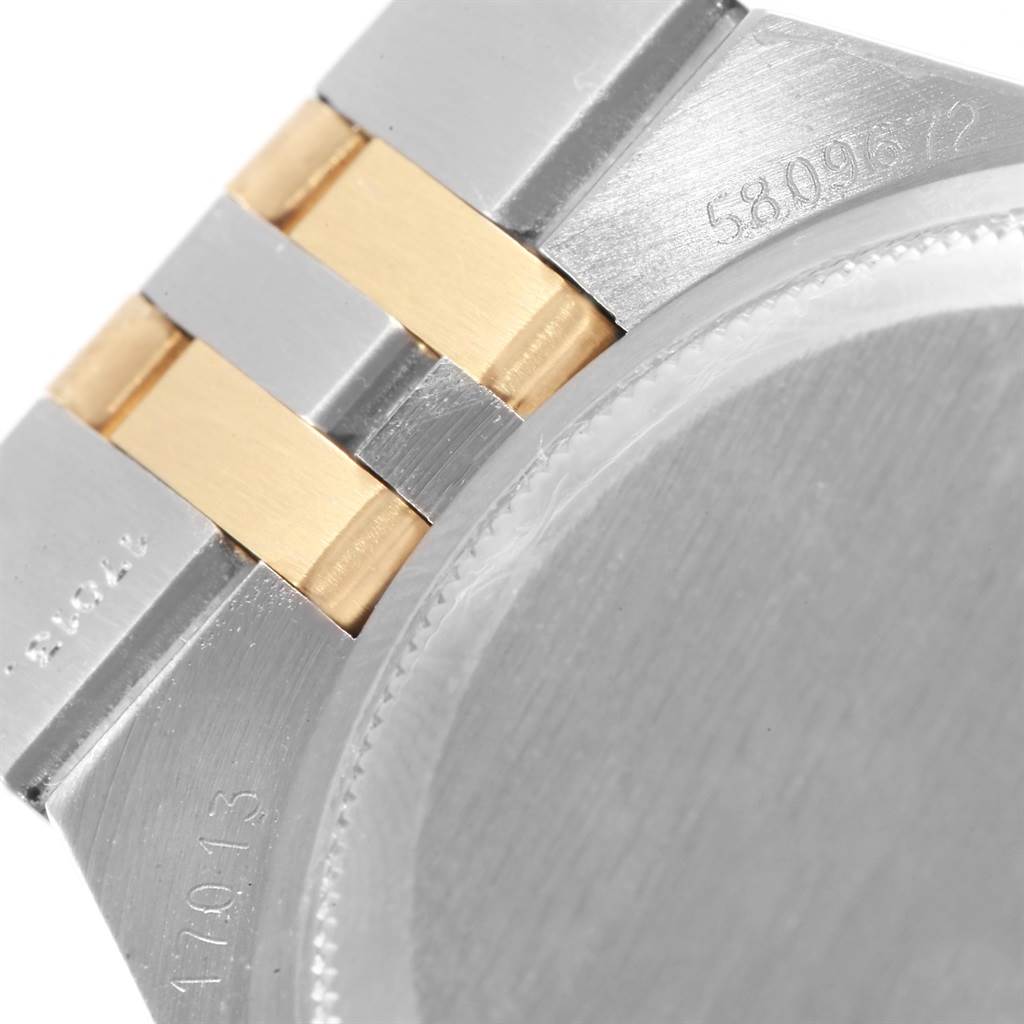 The image shows a close-up of the case back and the bracelet link for the Rolex Oysterquartz 17013 Men's Stainless Steel Blue Dial 17013 Men's Stainless Steel Blue Dial model.