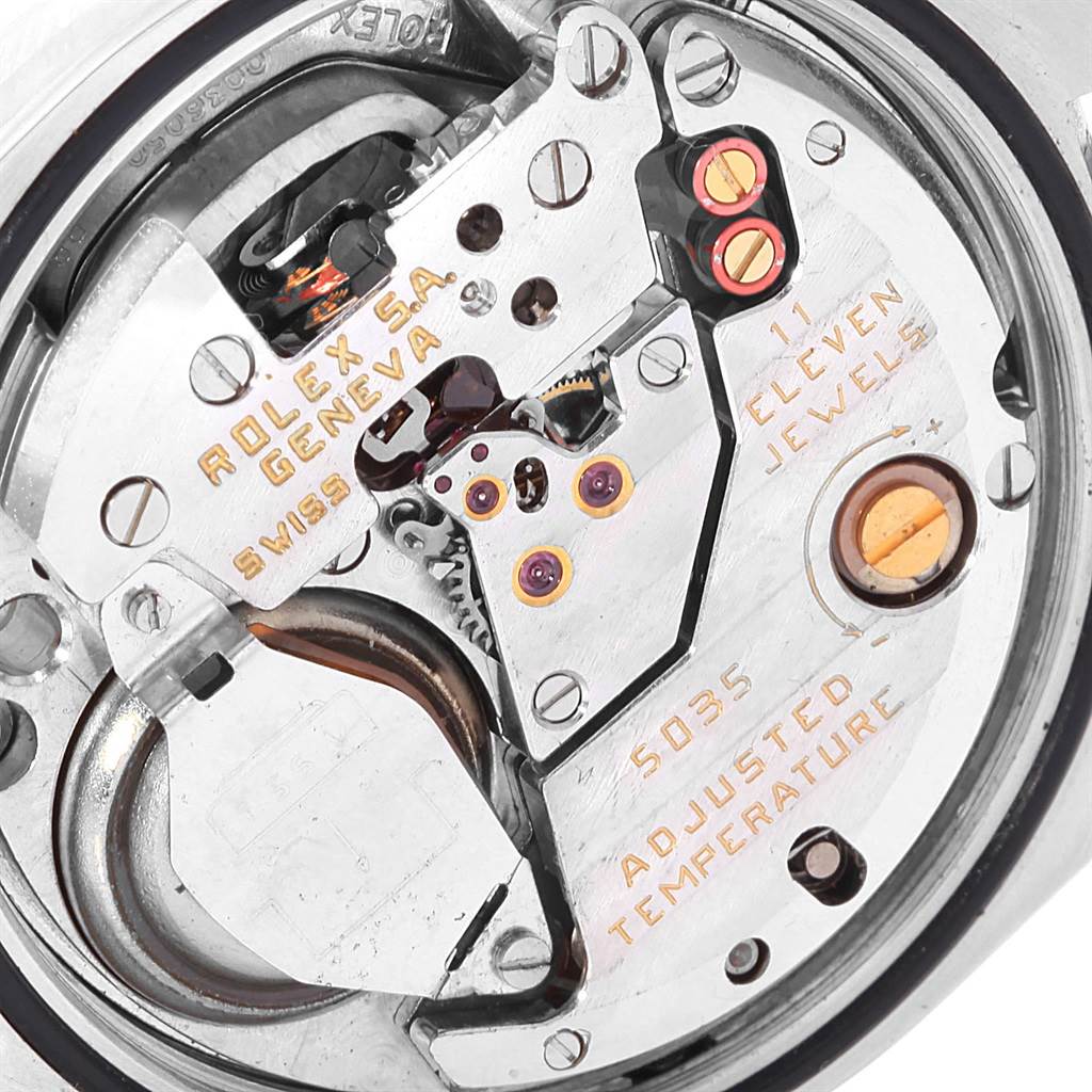This image shows an up-close view of the movement mechanism of a Rolex Oysterquartz 17013 Men's Stainless Steel Blue Dial 17013 Men's Stainless Steel Blue Dial watch.
