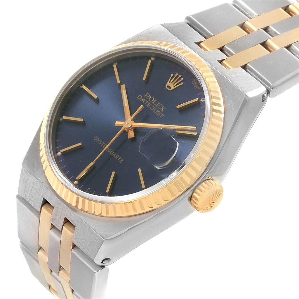 The Rolex Oysterquartz 17013 Men's Stainless Steel Blue Dial 17013 Men's Stainless Steel Blue Dial watch is shown at an angled view, highlighting its dial, crown, bezel, and bracelet.