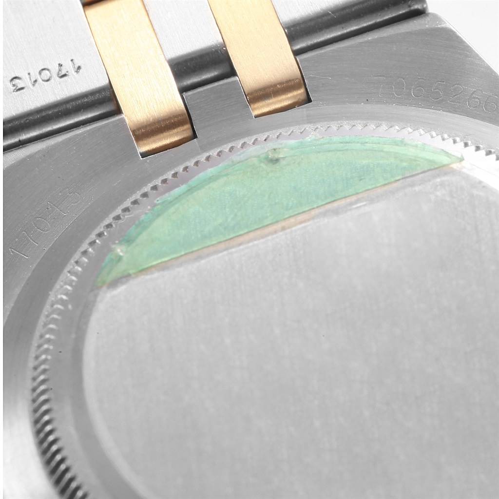 The image shows the back case of a Rolex Oysterquartz 17013 Men's Steel and Gold (two tone) White Dial 17013 Men's Steel and Gold (two tone) White Dial watch, focusing on the caseback and part of the bracelet.
