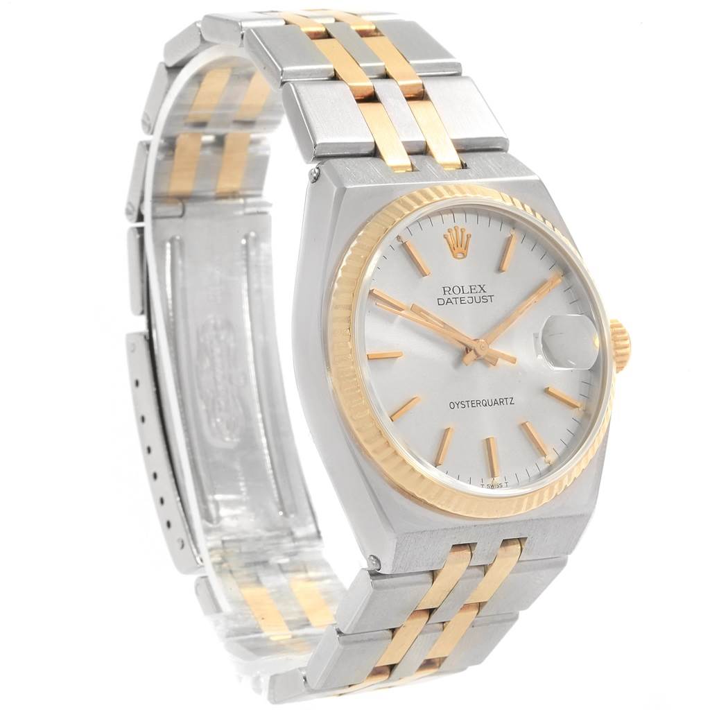 The Rolex Oysterquartz 17013 Men's Stainless Steel Silver Dial 17013 Men's Stainless Steel Silver Dial Datejust watch is shown at a slight angle, displaying the face, bezel, crown, and part of the bracelet.