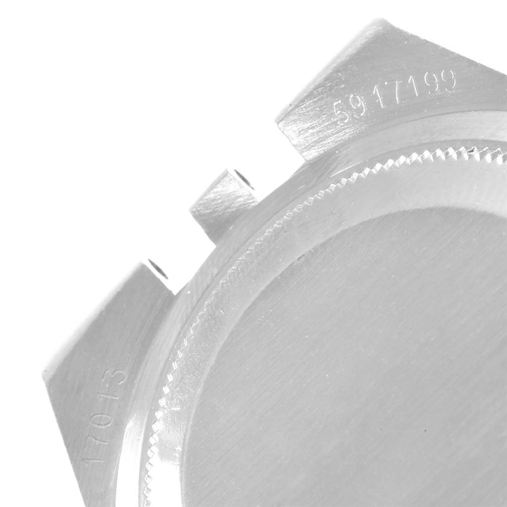 This image shows a close-up of the back casing and lugs of a Rolex Oysterquartz 17013 Men's Stainless Steel Silver Dial 17013 Men's Stainless Steel Silver Dial watch, with visible engraving.