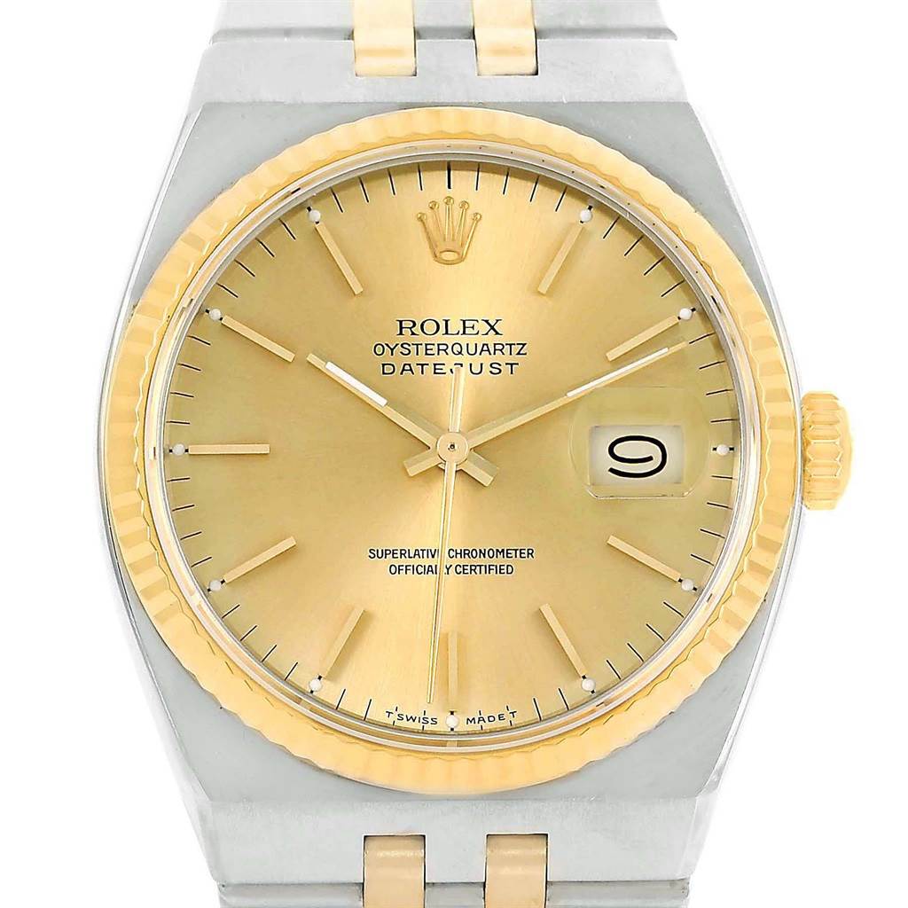 The image shows a Rolex Oysterquartz 17013 Men's Stainless Steel Champagne Dial 17013 Men's Stainless Steel Champagne Dial Datejust watch from a front perspective, highlighting the dial, hands, and bracelet.