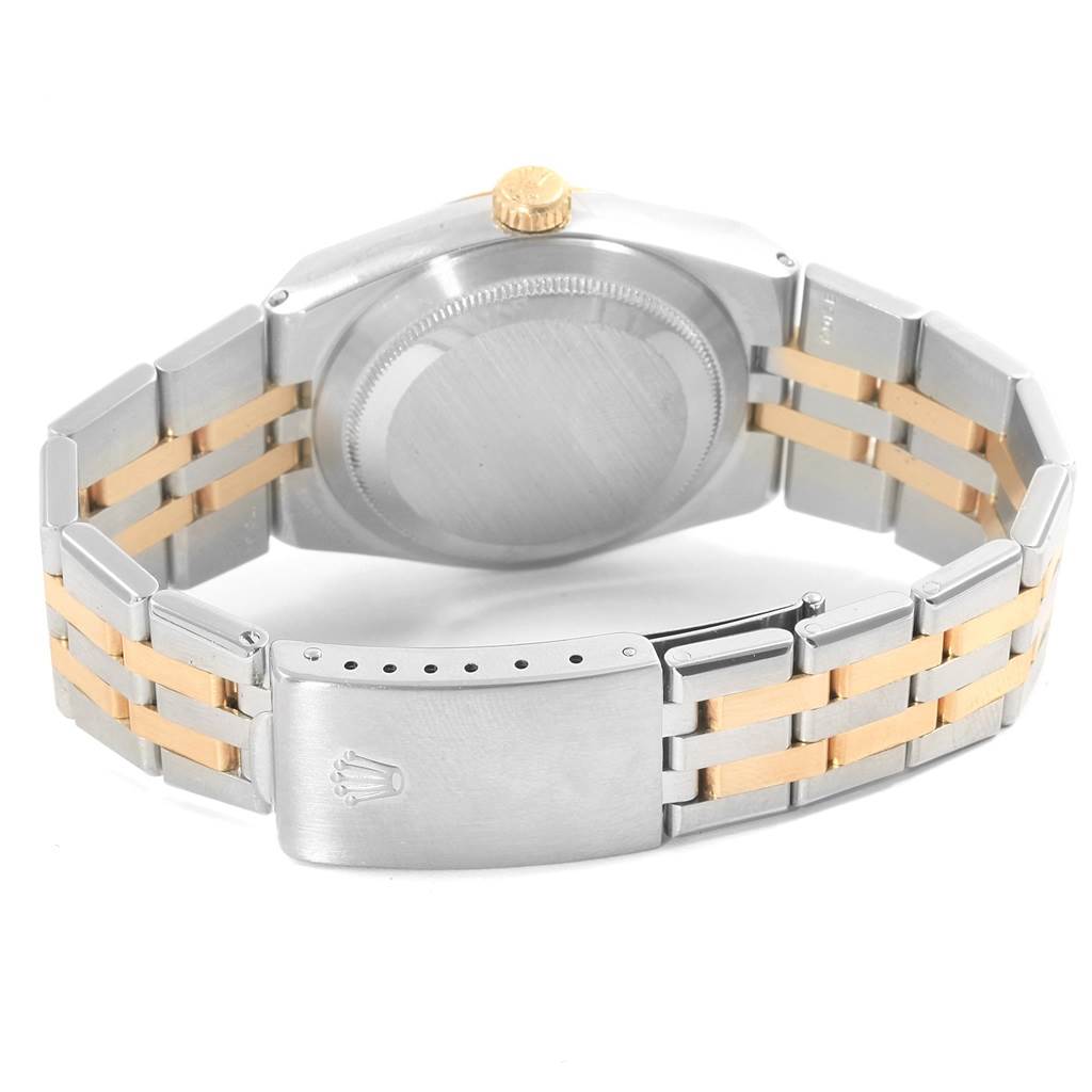 This image shows the back case and bracelet of a Rolex Oysterquartz 17013 Men's Stainless Steel Champagne Dial 17013 Men's Stainless Steel Champagne Dial watch mainly from the rear view.