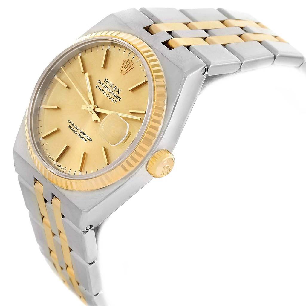 This image shows a Rolex Oysterquartz 17013 Men's Stainless Steel Champagne Dial 17013 Men's Stainless Steel Champagne Dial watch from an oblique angle, highlighting the dial, bezel, crown, and two-tone bracelet.