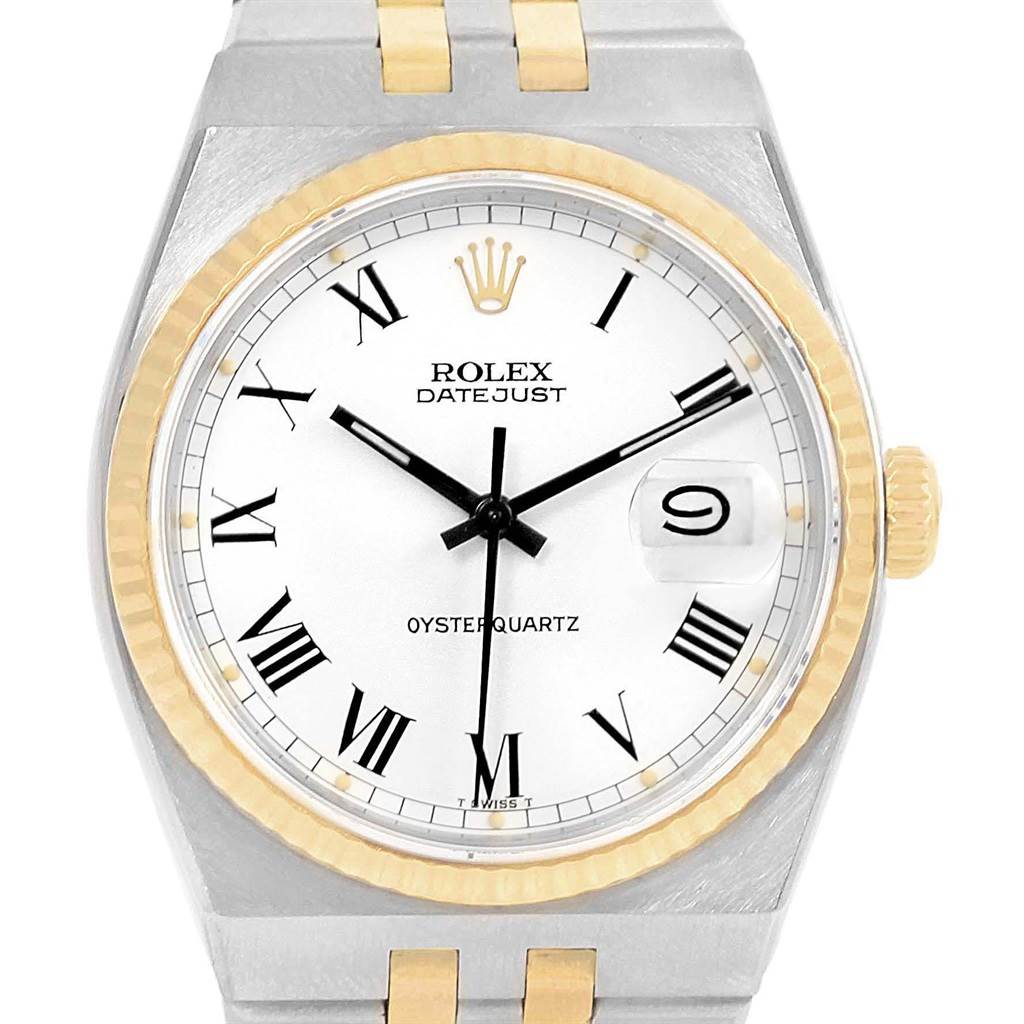 This image shows a front view of the Rolex Oysterquartz 17013 Men's Steel and Gold (two tone) White Dial 17013 Men's Steel and Gold (two tone) White Dial Datejust watch, highlighting the dial, hands, bezel, and part of the bracelet.