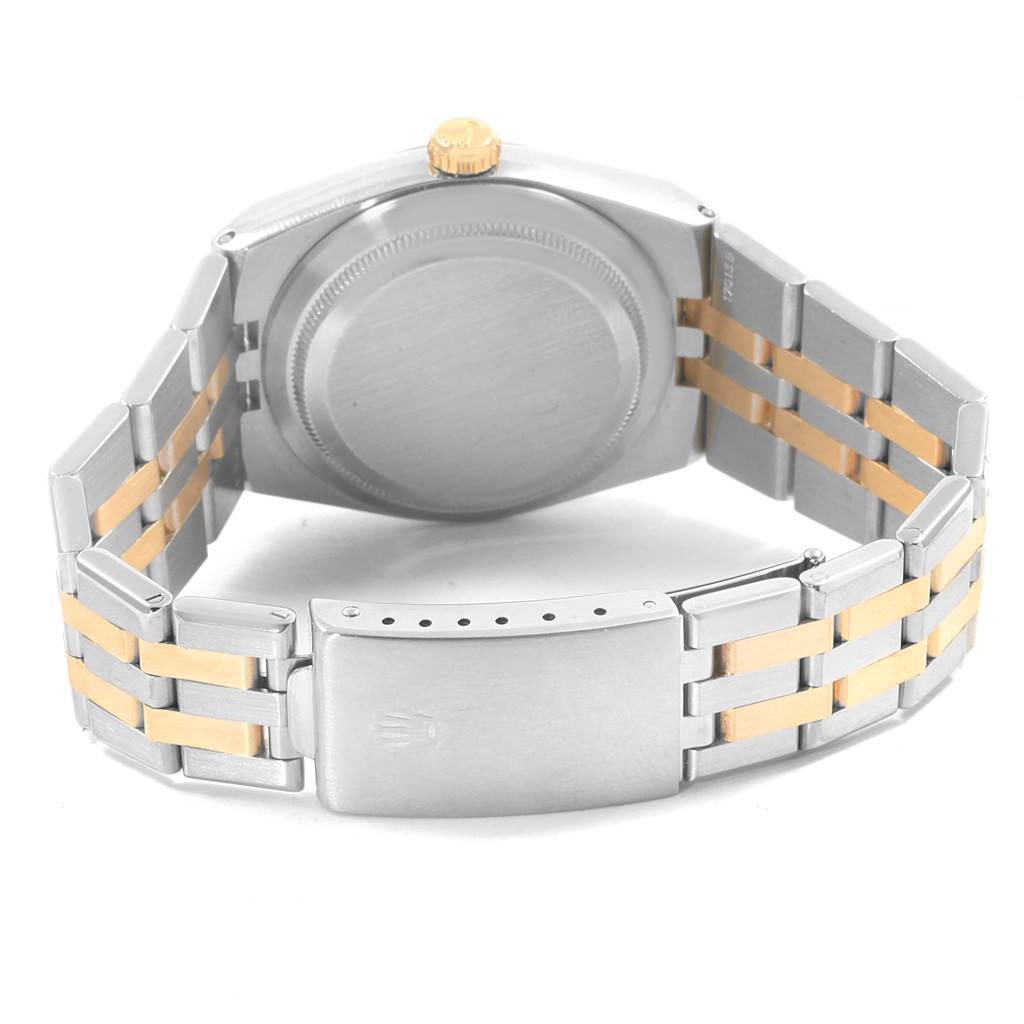 The image shows the back case and clasp of a Rolex Oysterquartz 17013 Men's Steel and Gold (two tone) White Dial 17013 Men's Steel and Gold (two tone) White Dial model watch, highlighting its two-tone metal band.