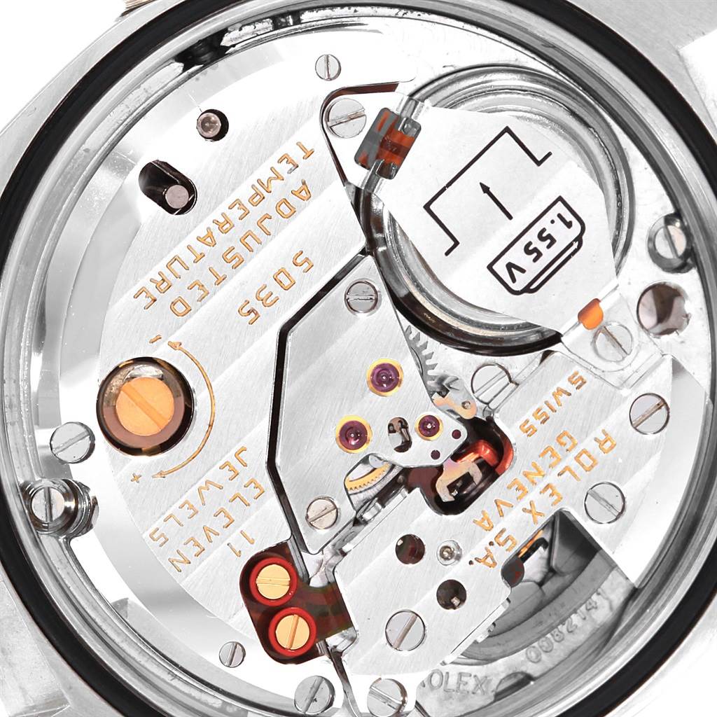 This image shows the internal mechanism and movement of a Rolex Oysterquartz 17000 Men
s Stainless Steel Silver Dial 17000 Men
s Stainless Steel Silver Dial watch from a close-up, top-down angle.