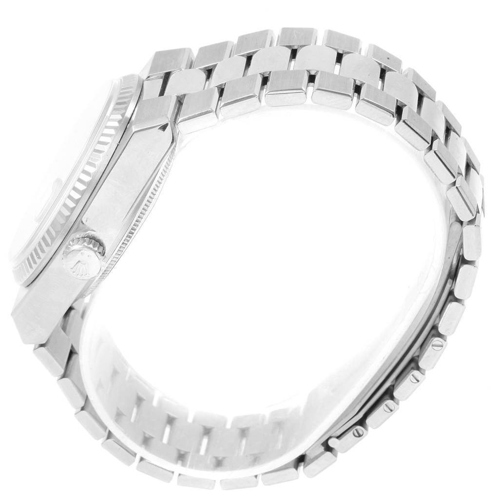 The image shows a side view of the Rolex Oysterquartz 19019 Men's White Gold Silver Dial 19019 Men's White Gold Silver Dial watch, highlighting the crown and the bracelet.