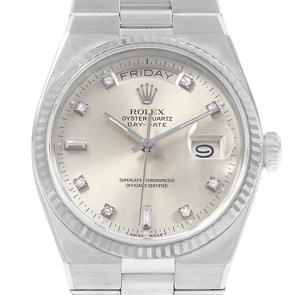 The image shows a front view of the Rolex Oysterquartz 19019 Men's White Gold Silver Dial 19019 Men's White Gold Silver Dial watch, highlighting its dial, hands, date window, and bracelet.