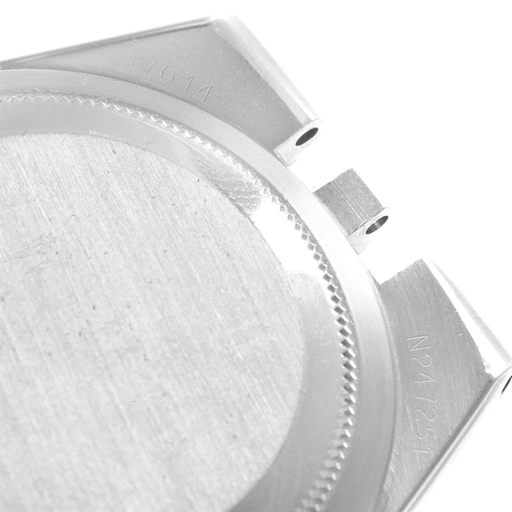 The image shows the back case of a Rolex Oysterquartz 17014 Men's Stainless Steel Blue Dial 17014 Men's Stainless Steel Blue Dial watch at an angled view, highlighting the lugs and part of the serial number.