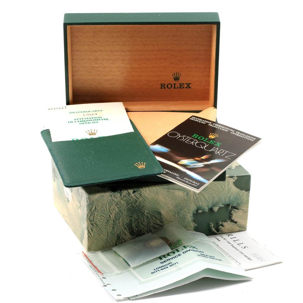 The image shows a Rolex Oysterquartz 17014 Men's Stainless Steel Blue Dial 17014 Men's Stainless Steel Blue Dial watch box with manuals, documents, and accessories viewed from the top front angle.