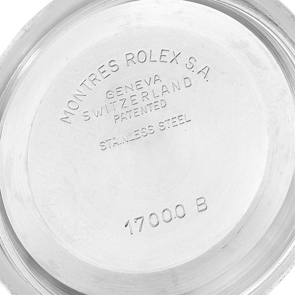 The image shows the stainless steel case back of a Rolex Oysterquartz 17000 Men's Stainless Steel White Dial 17000 Men's Stainless Steel White Dial watch, with model and brand engravings visible.
