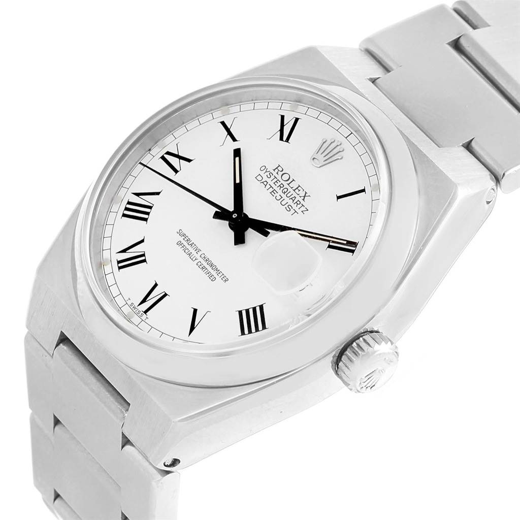 The image shows a Rolex Oysterquartz 17000 Men's Stainless Steel White Dial 17000 Men's Stainless Steel White Dial Datejust watch at an angle displaying the face, bezel, crown, and part of the bracelet.