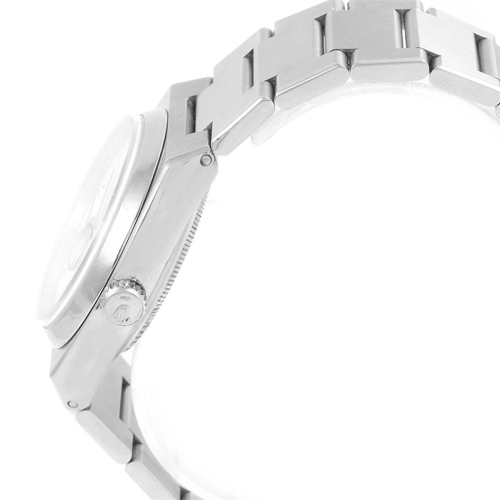 The image shows a side profile of the Rolex Oysterquartz 17000 Men's Stainless Steel White Dial 17000 Men's Stainless Steel White Dial watch, featuring the case, crown, and part of the bracelet.