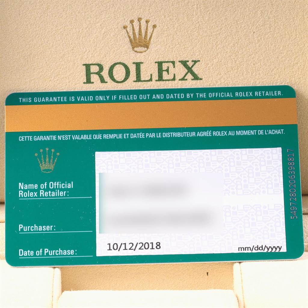 The image shows a warranty card for a Rolex Oysterquartz 114200 Men
s Stainless Steel Burgundy Dial 114200 Men
s Stainless Steel Burgundy Dial watch, indicating purchase details and retailer information.