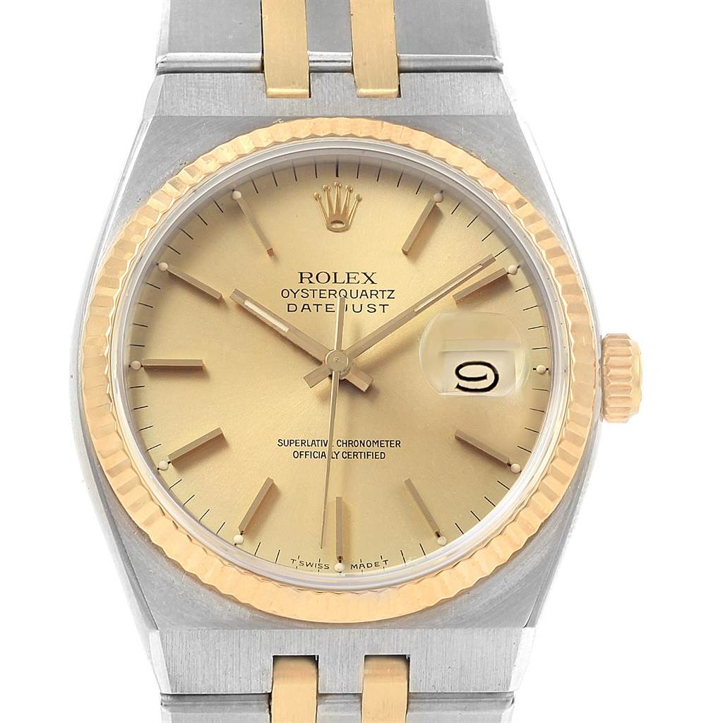 The image shows a front view of a Rolex Oysterquartz 17013 Men
s Stainless Steel Champagne Dial 17013 Men
s Stainless Steel Champagne Dial Datejust watch, highlighting the dial, hands, bezel, and part of the bracelet.