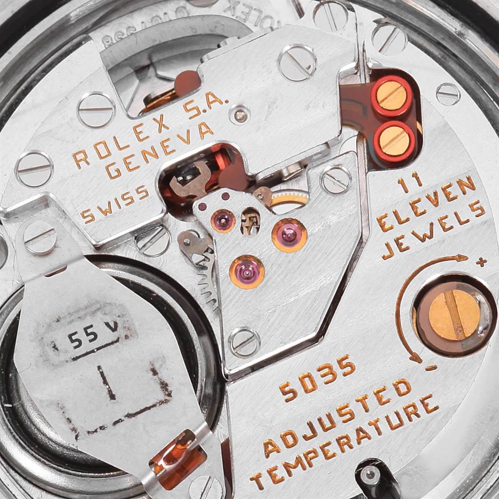 Close-up view of the movement mechanism in a Rolex Oysterquartz 17013 Men
s Stainless Steel Champagne Dial 17013 Men
s Stainless Steel Champagne Dial model, showcasing inscriptions and internal components.
