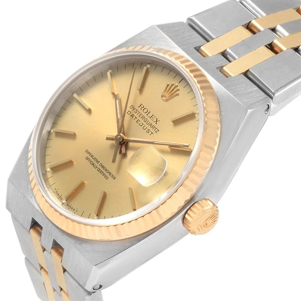 The image shows a close-up, angled view of the Rolex Oysterquartz 17013 Men
s Stainless Steel Champagne Dial 17013 Men
s Stainless Steel Champagne Dial Datejust, highlighting the dial, bezel, and part of the bracelet.