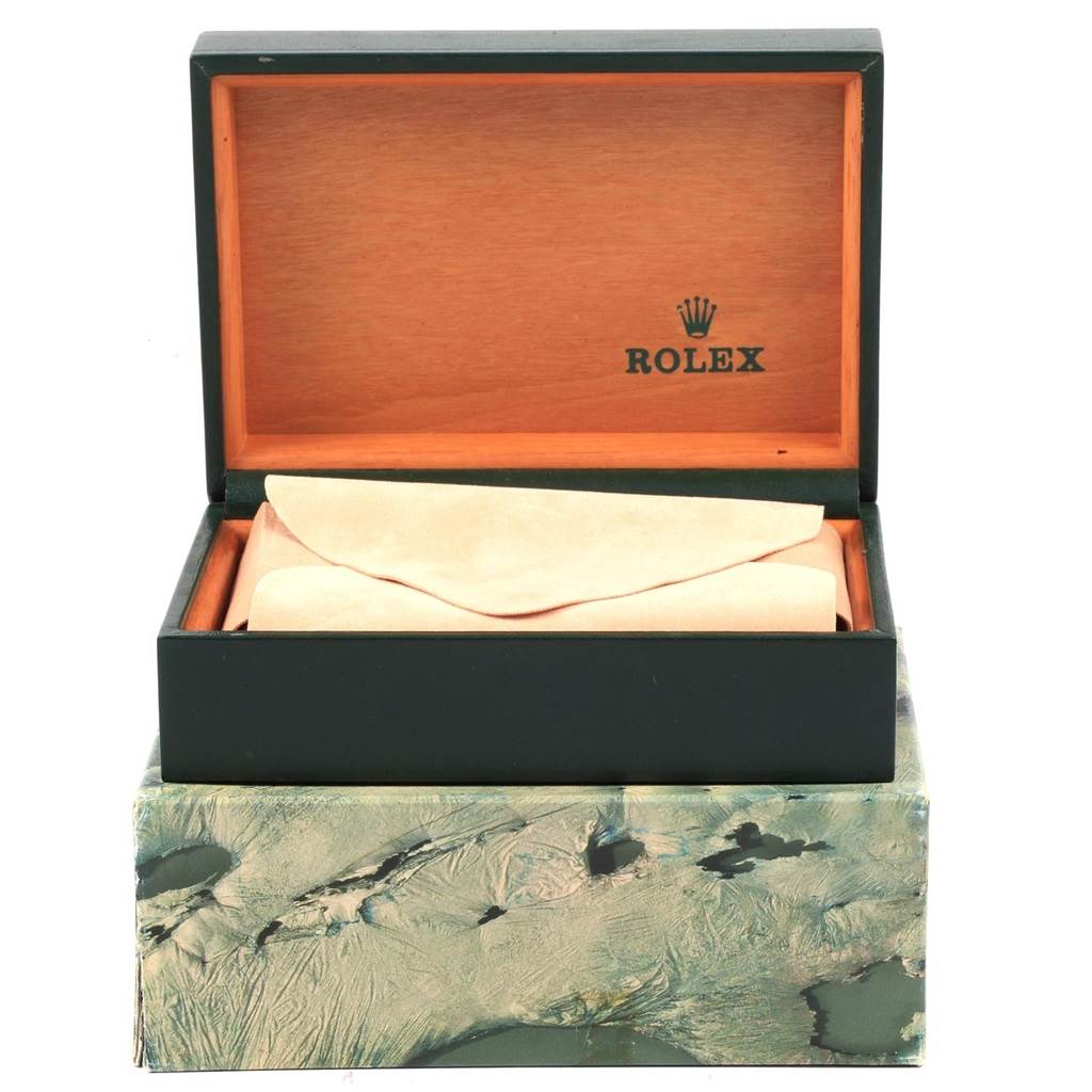 The image shows an open Rolex box with a cushion for a Rolex Oysterquartz 17013 Men
s Stainless Steel Champagne Dial 17013 Men
s Stainless Steel Champagne Dial model watch, viewed from the front.