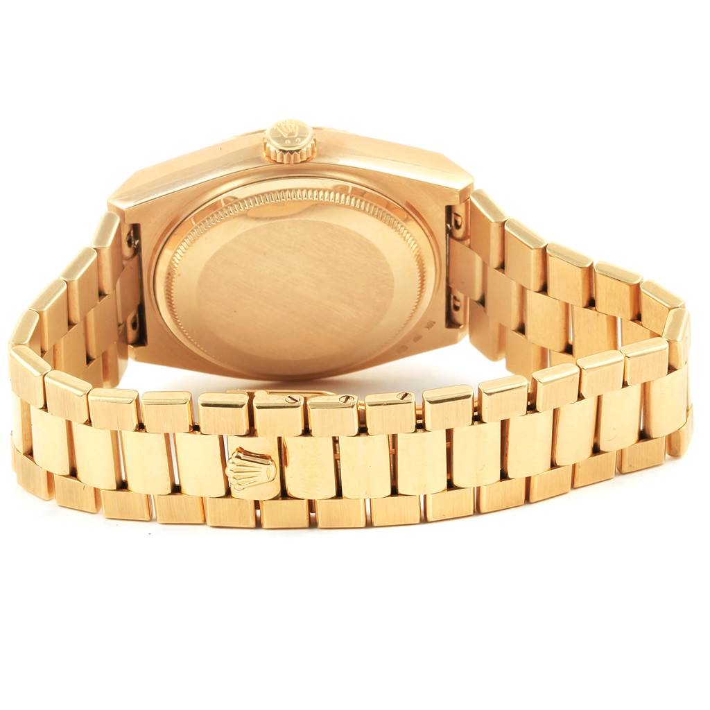 The image shows a Rolex Oysterquartz 19018 Men's Yellow Gold Black Dial 19018 Men's Yellow Gold Black Dial watch from the back, highlighting the case, crown, and bracelet.