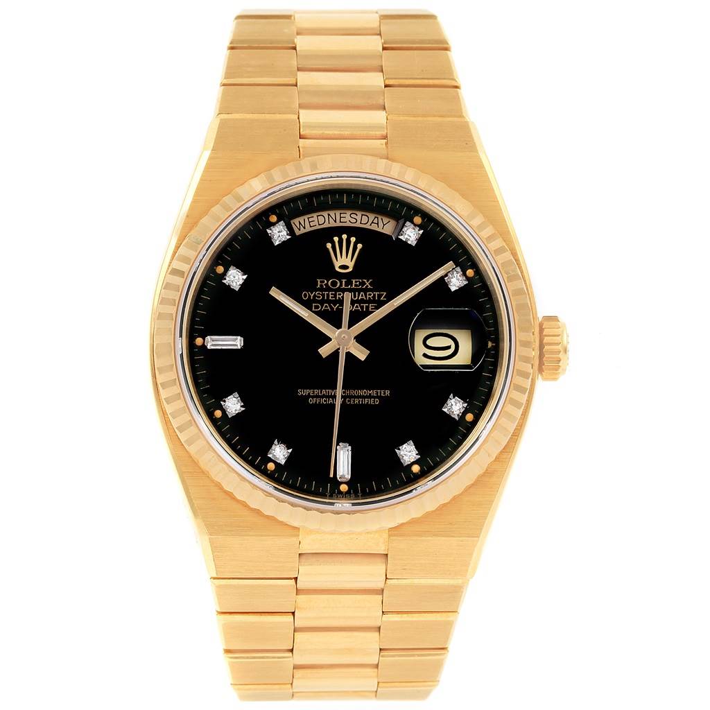 The image shows a front view of a Rolex Oysterquartz 19018 Men's Yellow Gold Black Dial 19018 Men's Yellow Gold Black Dial watch, highlighting the black dial, date window, and gold bracelet.