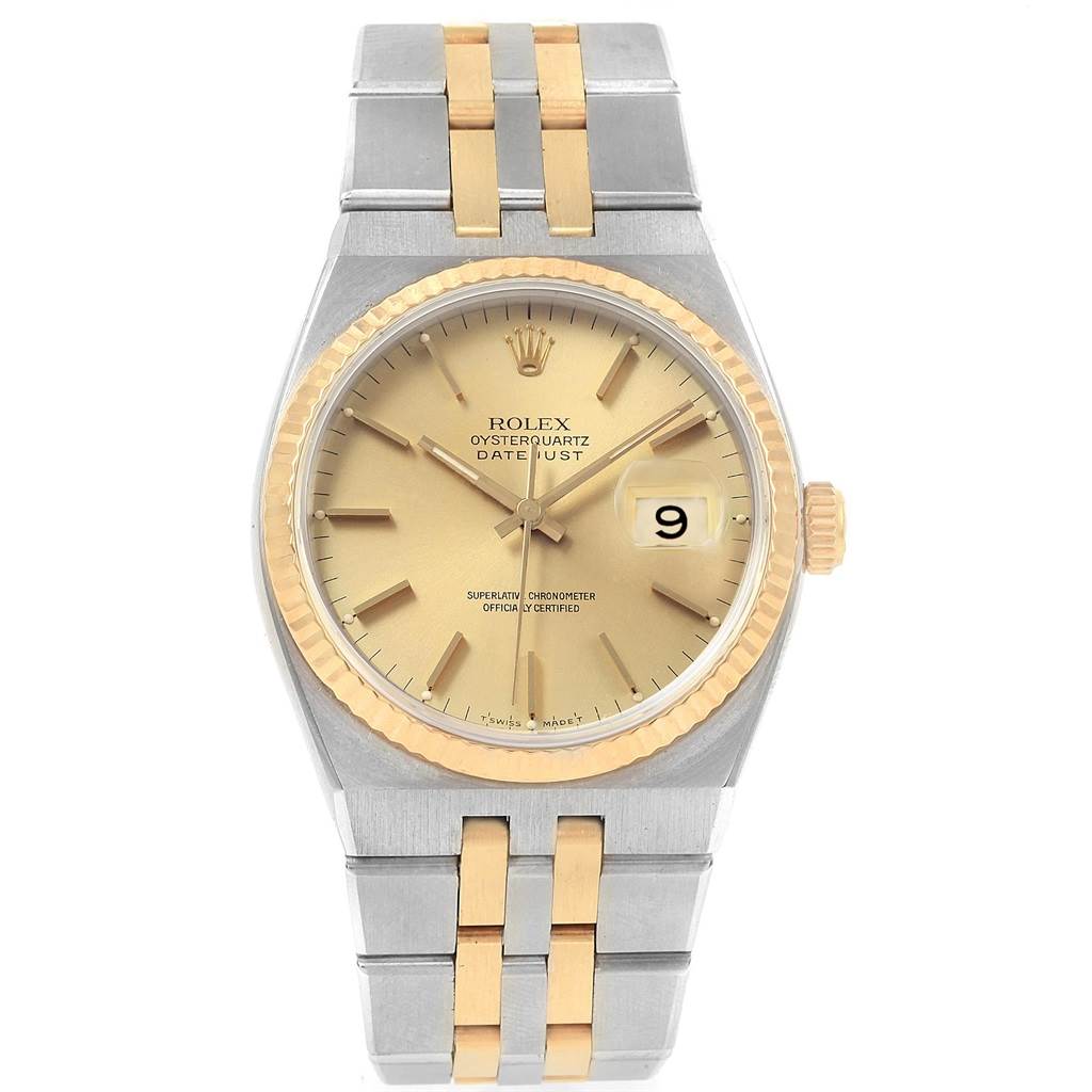 The image shows a front view of a Rolex Oysterquartz 17013 Men
s Stainless Steel Champagne Dial 17013 Men
s Stainless Steel Champagne Dial Datejust watch with a two-tone metal bracelet and gold bezel.