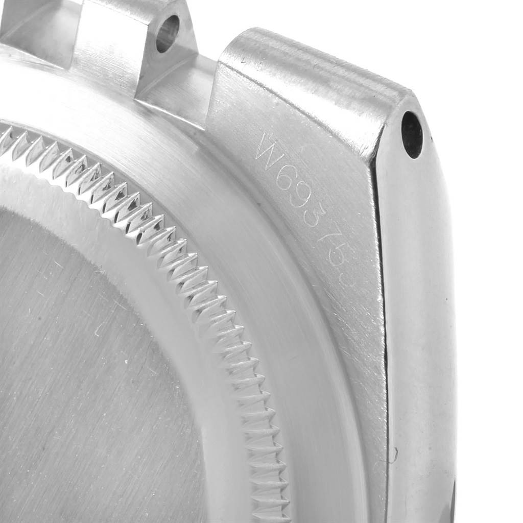 The image shows a close-up side view of a Rolex Oysterquartz 17013 Men
s Stainless Steel Champagne Dial 17013 Men
s Stainless Steel Champagne Dial watch case, detailing the lugs and case back.