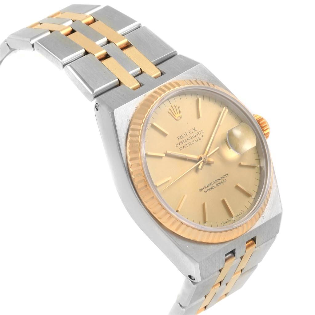 This image shows a Rolex Oysterquartz 17013 Men
s Stainless Steel Champagne Dial 17013 Men
s Stainless Steel Champagne Dial watch at an angle highlighting the bracelet, dial, and crown.