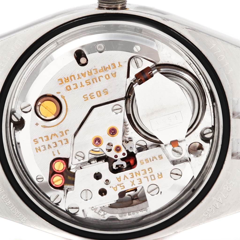 The image shows the inner mechanics of a Rolex Oysterquartz 17013 Men
s Stainless Steel Silver Dial 17013 Men
s Stainless Steel Silver Dial watch from a top-down angle.