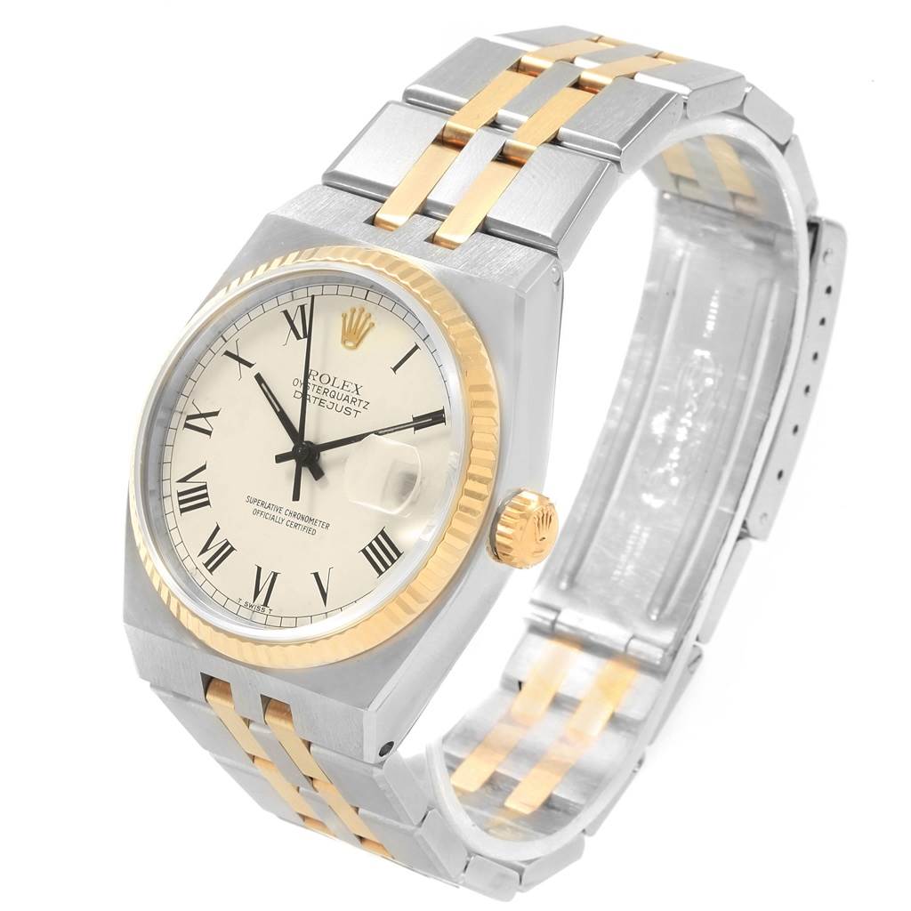 The Rolex Oysterquartz 17013 Men's Steel and Gold (two tone) White Dial 17013 Men's Steel and Gold (two tone) White Dial watch is shown at an angled view, displaying the face, bezel, bracelet, and crown.