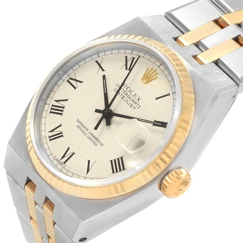 The image shows a close-up angle of the Rolex Oysterquartz 17013 Men's Steel and Gold (two tone) White Dial 17013 Men's Steel and Gold (two tone) White Dial Datejust watch, highlighting the dial, crown, bezel, and part of the bracelet.