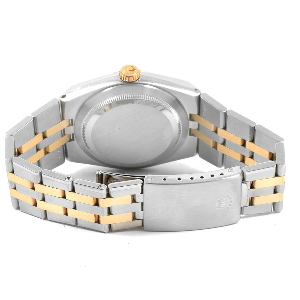 The image shows the back case, crown, and two-tone bracelet of a Rolex Oysterquartz 17013 Men's Steel and Gold (two tone) White Dial 17013 Men's Steel and Gold (two tone) White Dial watch.