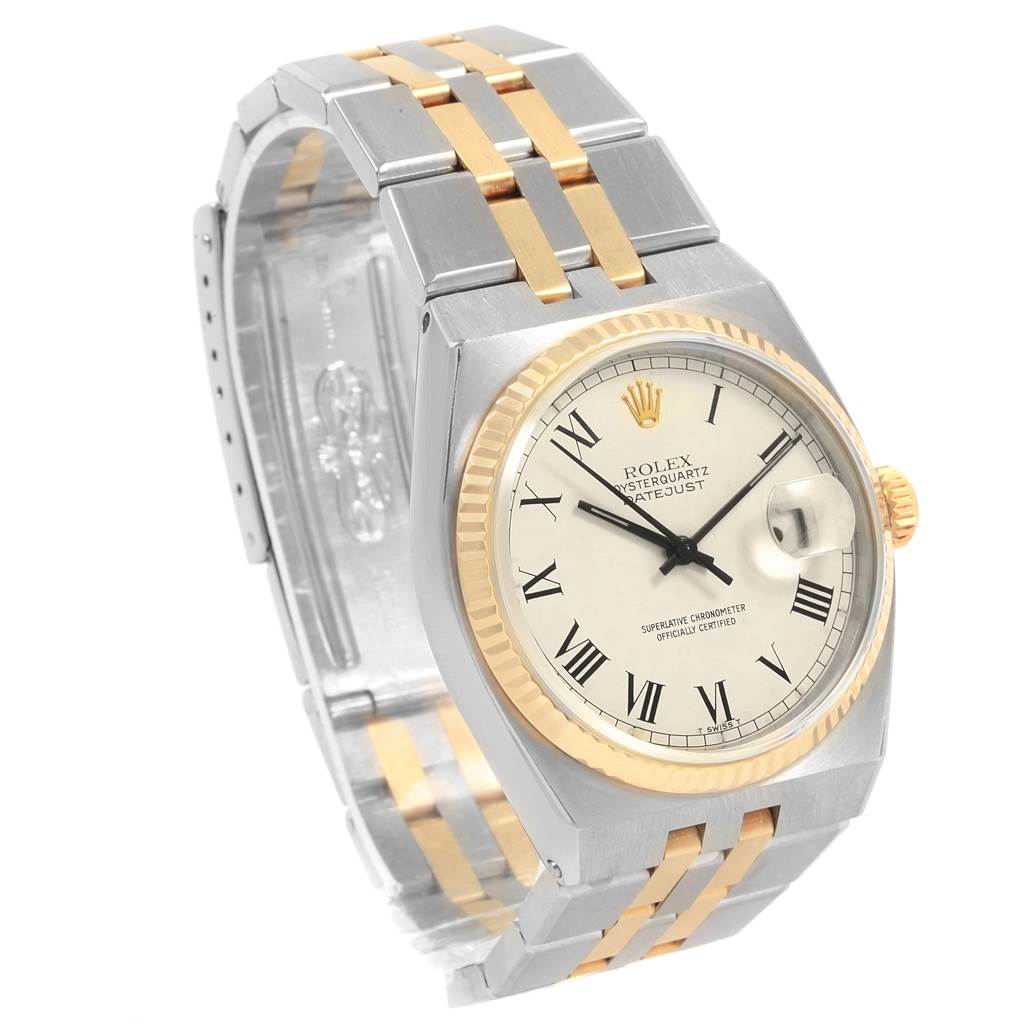 This image shows a Rolex Oysterquartz 17013 Men's Steel and Gold (two tone) White Dial 17013 Men's Steel and Gold (two tone) White Dial watch at a three-quarter angle, revealing the dial, bezel, crown, and part of the two-tone bracelet.