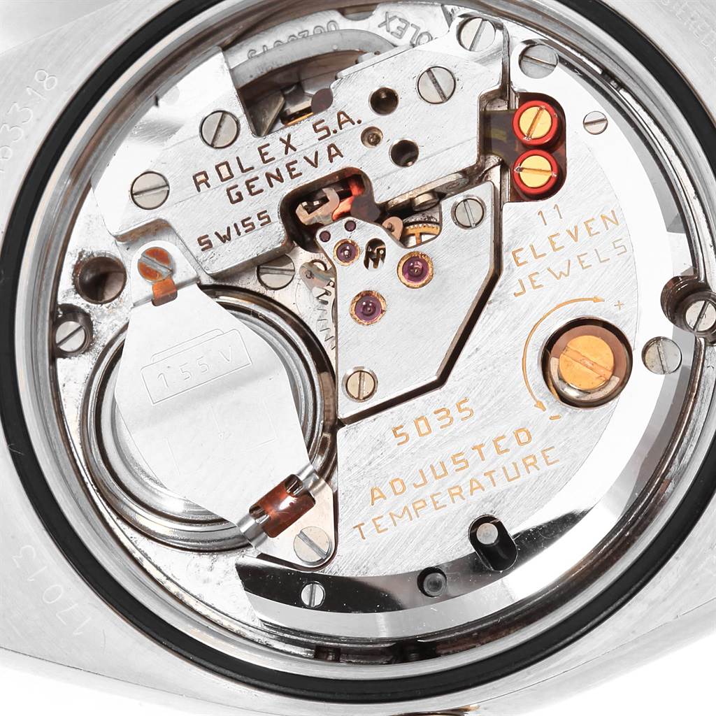 The image shows a close-up view of the internal mechanism of a Rolex Oysterquartz 17013 Men's Steel and Gold (two tone) White Dial 17013 Men's Steel and Gold (two tone) White Dial watch model.