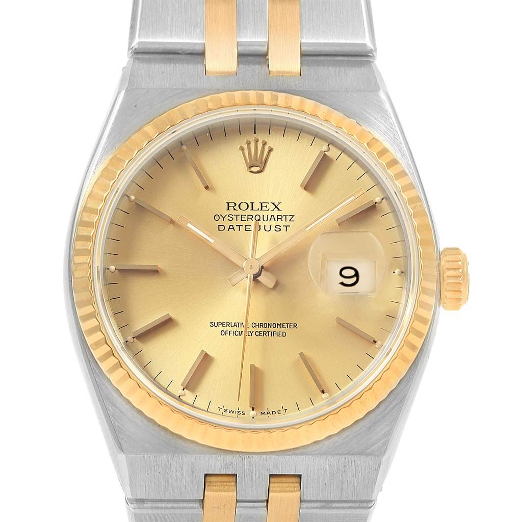 This image shows a front view of a Rolex Oysterquartz 17013 Men
s Stainless Steel Champagne Dial 17013 Men
s Stainless Steel Champagne Dial Datejust watch, displaying its dial, bezel, crown, and part of the bracelet.