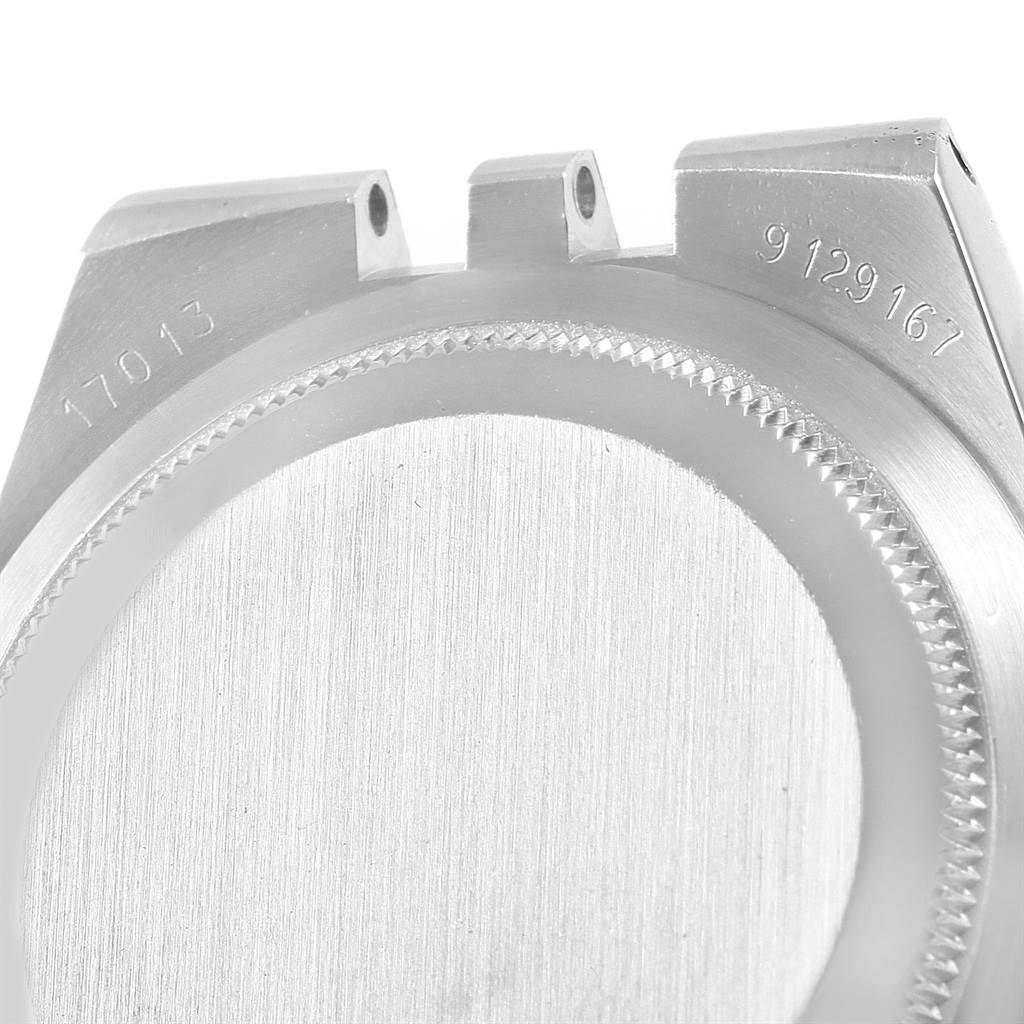 This image shows the case back and part of the lugs of the Rolex Oysterquartz 17013 Men
s Stainless Steel Champagne Dial 17013 Men
s Stainless Steel Champagne Dial model, with visible reference and serial numbers.