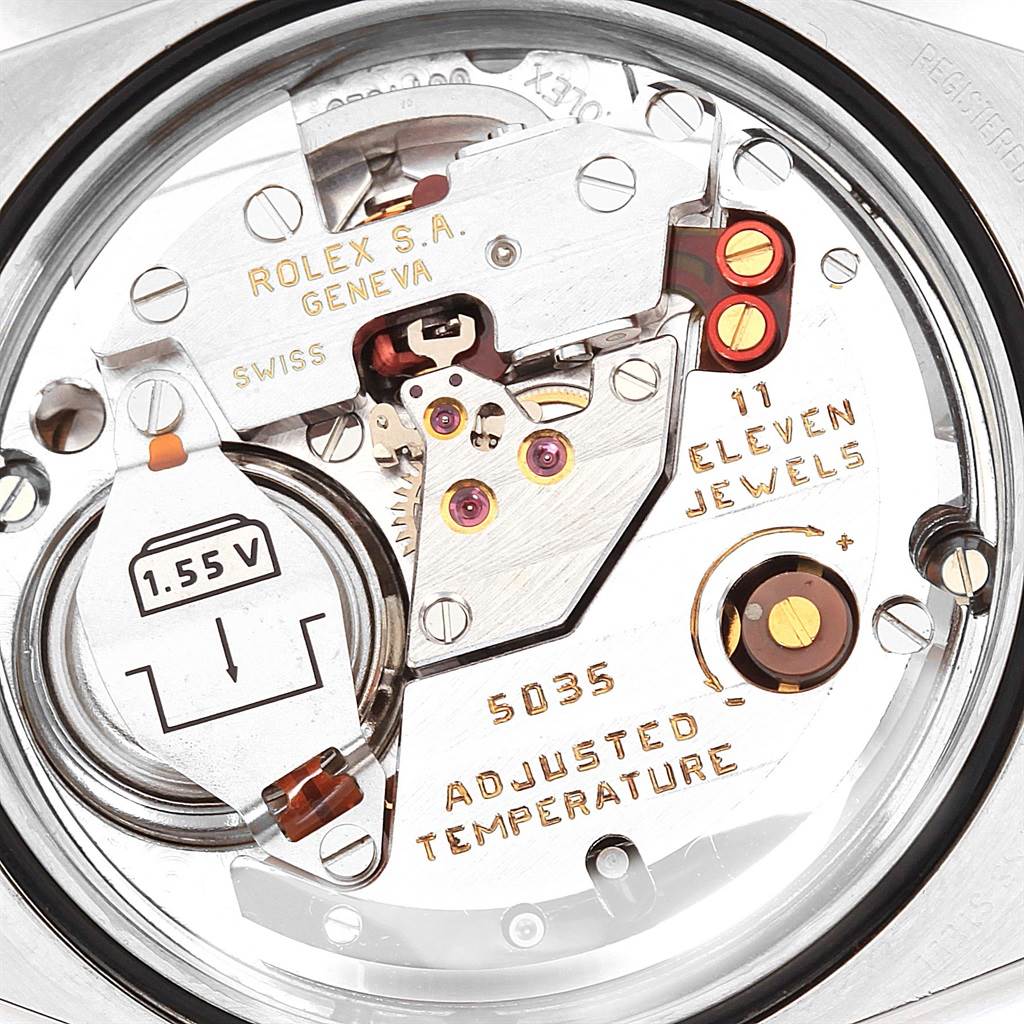 This image shows the internal movement mechanism of a Rolex Oysterquartz 17013 Men
s Stainless Steel Champagne Dial 17013 Men
s Stainless Steel Champagne Dial watch at a close-up angle.