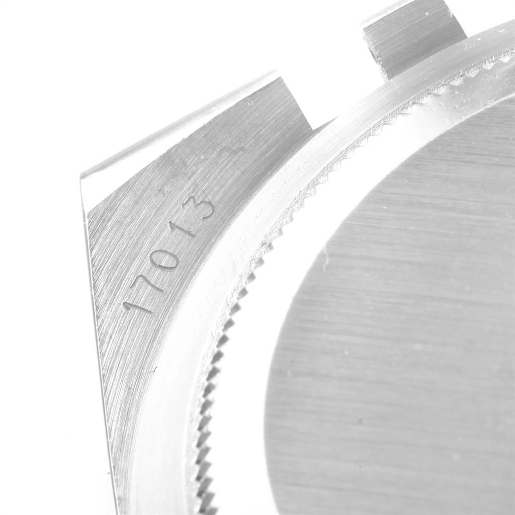 The image shows a close-up of the case back and reference number "17013" of a Rolex Oysterquartz 17013 Men
s Stainless Steel Blue Dial 17013 Men
s Stainless Steel Blue Dial watch.