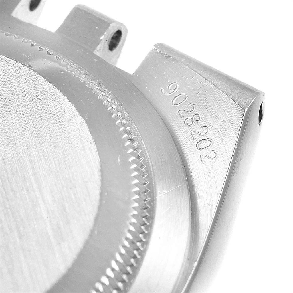 This image shows a close-up of the case back and part of the lug area of a Rolex Oysterquartz 17013 Men
s Stainless Steel Blue Dial 17013 Men
s Stainless Steel Blue Dial watch with the serial number visible.