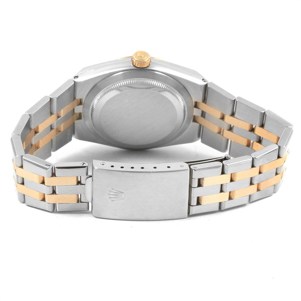 The image shows the back view of a Rolex Oysterquartz 17013 Men
s Stainless Steel Blue Dial 17013 Men
s Stainless Steel Blue Dial watch, highlighting the case back, crown, and two-tone bracelet with a clasp.