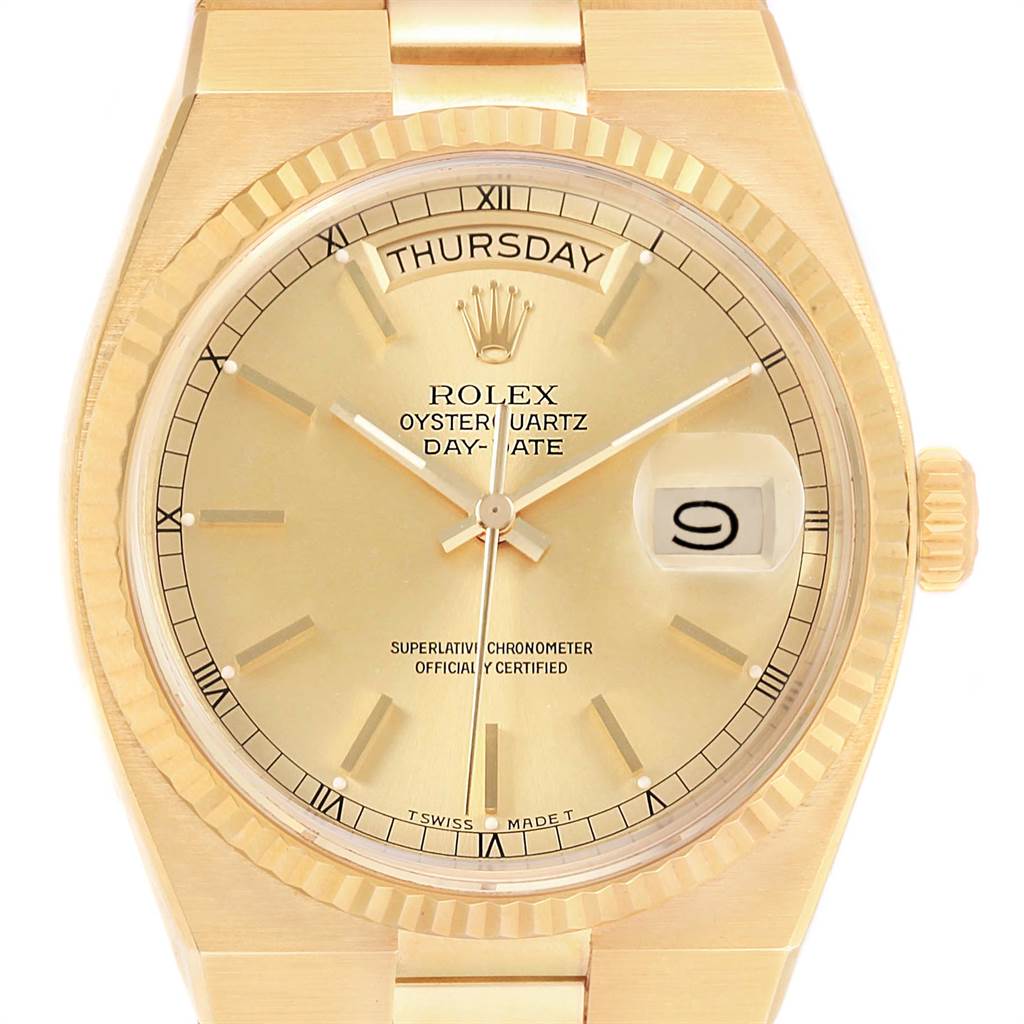 The Rolex Oysterquartz 19018 Men
s Yellow Gold Champagne Dial 19018 Men
s Yellow Gold Champagne Dial watch is shown from a front angle, displaying the face, crown, and part of the bracelet.