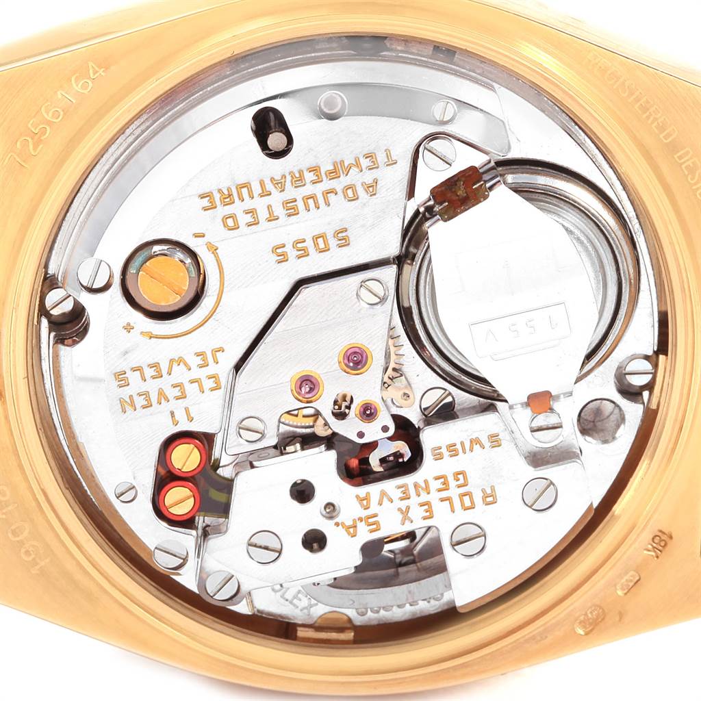 The image shows the internal movement of a Rolex Oysterquartz 19018 Men
s Yellow Gold Champagne Dial 19018 Men
s Yellow Gold Champagne Dial watch from a top-down angle.