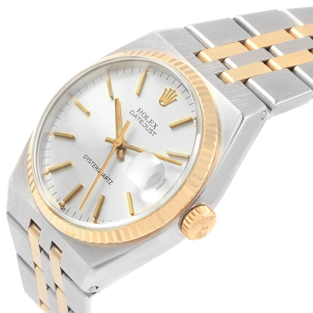 The image shows a tilted Rolex Oysterquartz 21993 Men
s Stainless Steel Silver Dial 21993 Men
s Stainless Steel Silver Dial watch, highlighting its dial, crown, bezel, and two-tone bracelet.