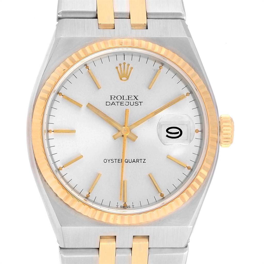 The image shows a front view of a Rolex Oysterquartz 21993 Men
s Stainless Steel Silver Dial 21993 Men
s Stainless Steel Silver Dial Datejust, featuring a gold fluted bezel, gold hands, and a date window at 3 o
clock.