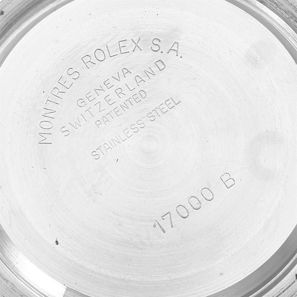 This image shows the back case of a Rolex Oysterquartz 21993 Men
s Stainless Steel Silver Dial 21993 Men
s Stainless Steel Silver Dial watch, featuring the model number and brand engravings.