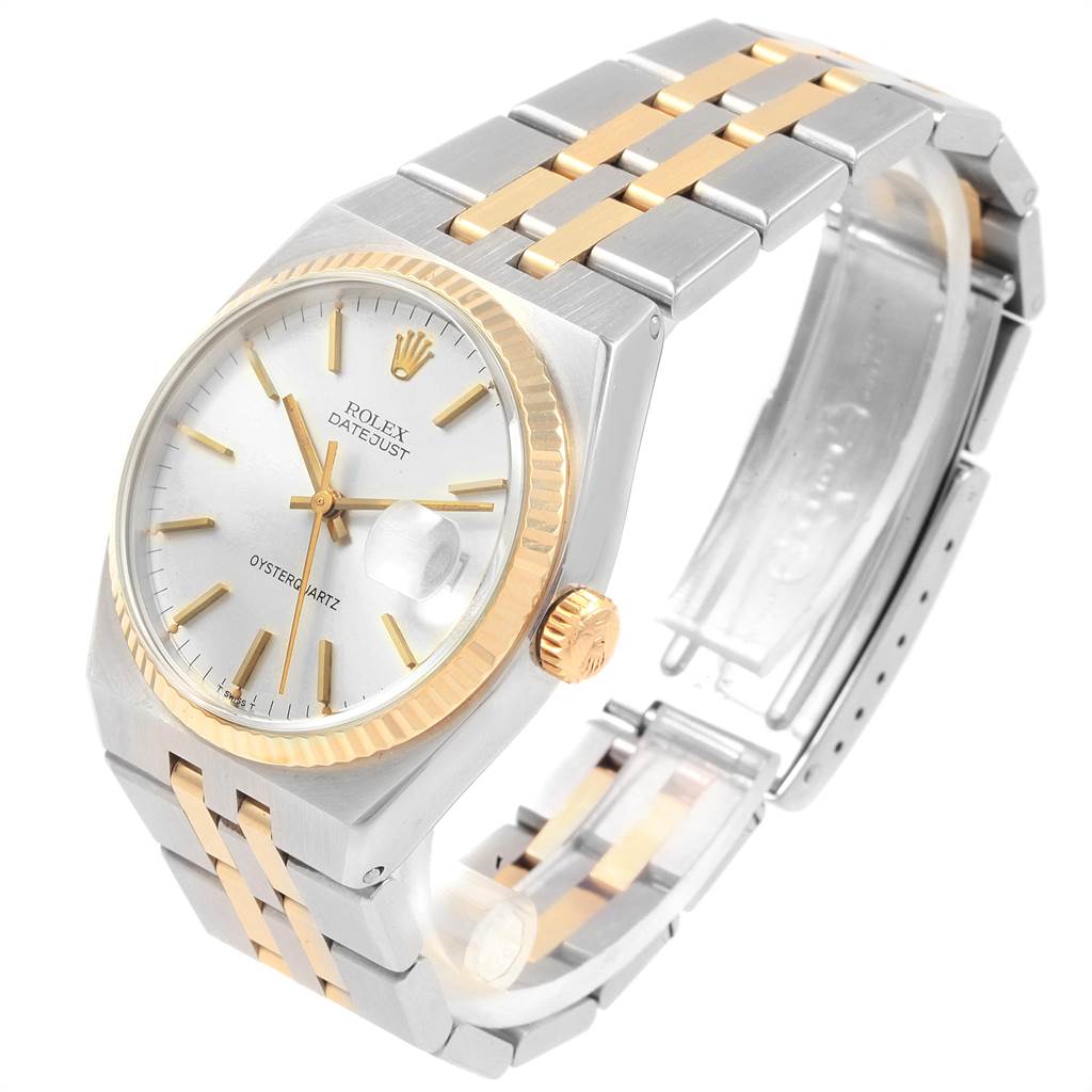 The Rolex Oysterquartz 21993 Men
s Stainless Steel Silver Dial 21993 Men
s Stainless Steel Silver Dial watch is shown at a three-quarter angle, displaying the face, crown, bracelet, and clasp.