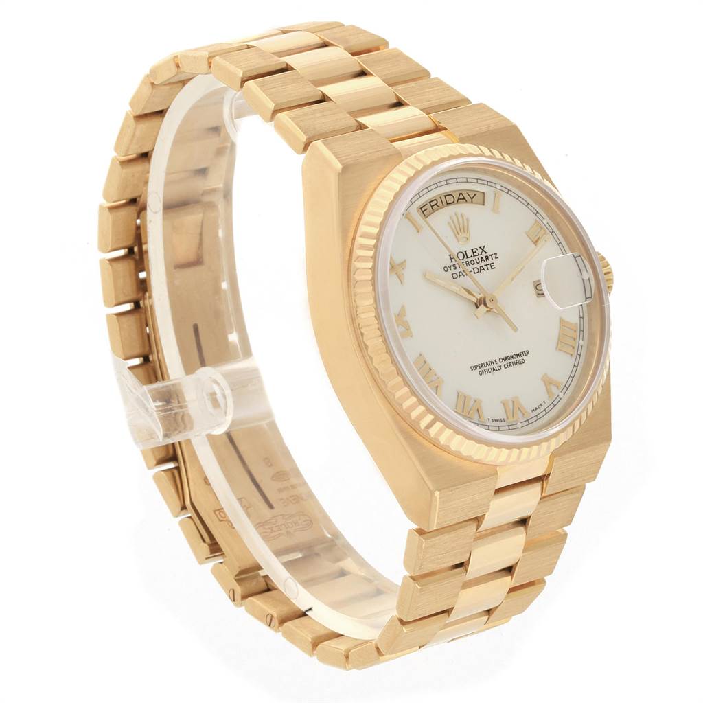 This image shows a side angle of a Rolex Oysterquartz 19018 Men's Yellow Gold White Dial 19018 Men's Yellow Gold White Dial model, displaying the watch face, bezel, and bracelet.