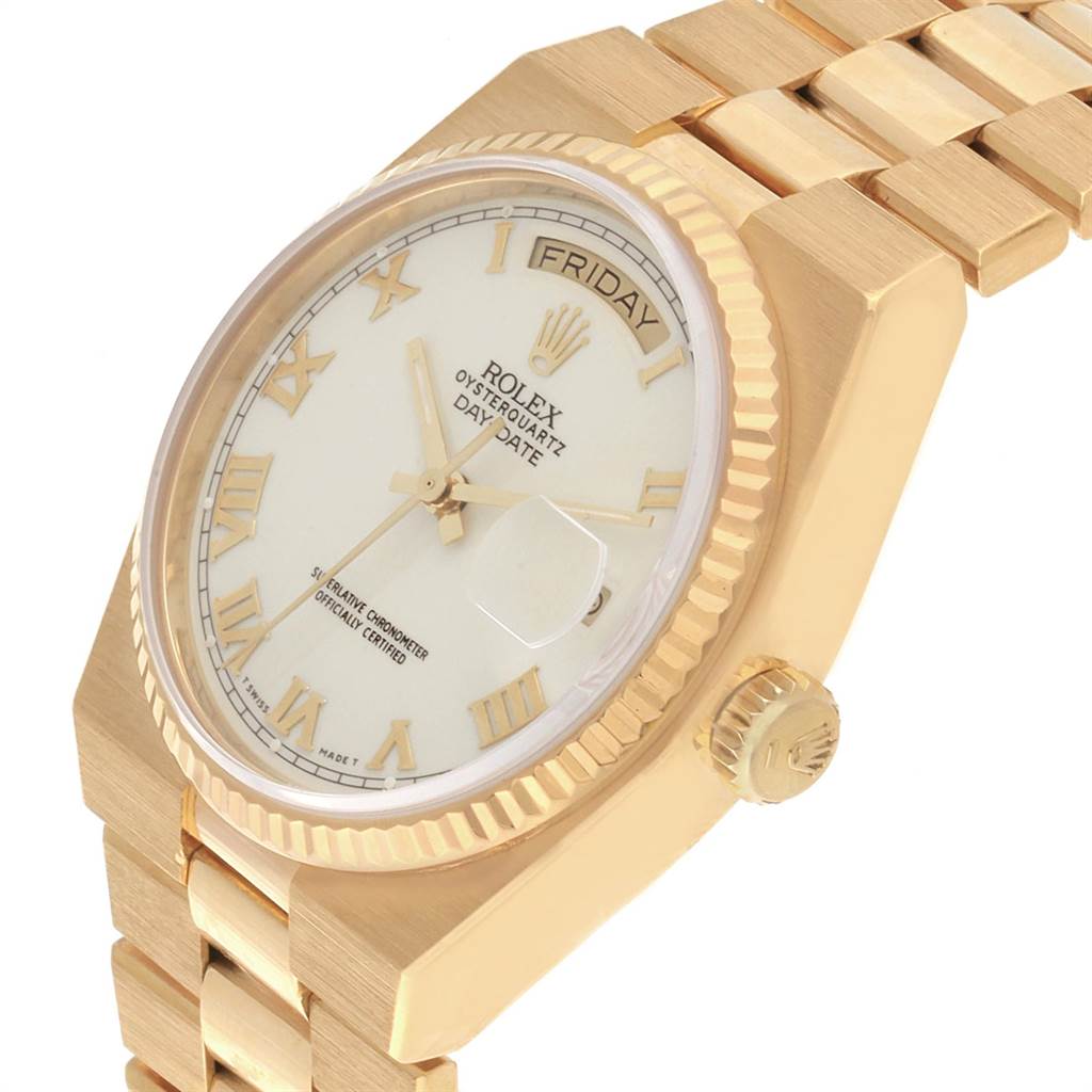 Angled view of the Rolex Oysterquartz 19018 Men's Yellow Gold White Dial 19018 Men's Yellow Gold White Dial showing the face, crown, and part of the bracelet.